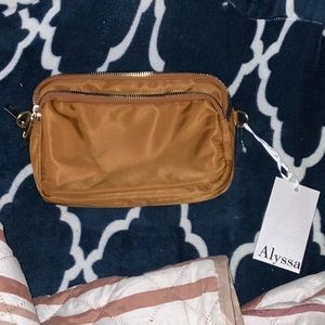 Brand new hand bag Wallet. 4 sizable pockets.